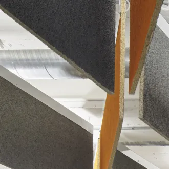 Ceiling baffles hanging from ceiling in office space