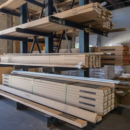 Stack of boxes and packages in a warehouse on shelves